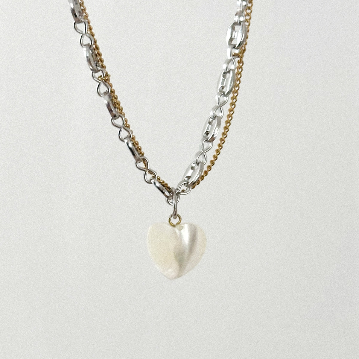 Collier - Coeur nacré et chaînes mixtes